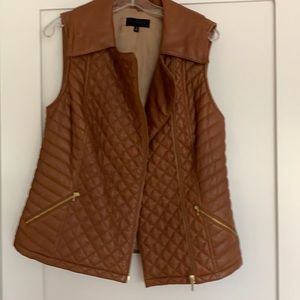 Leather quilted vest.